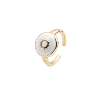 Detailed macro of gold-plated adjustable ring featuring white enamel sun pattern