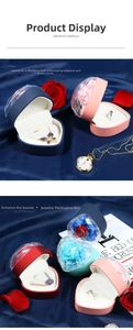 Detailed view of heart-shaped jewelry boxes with transparent lids in various colors