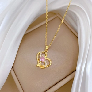 Irregular heart pendant necklace with pink gem on silk for luxury jewelry display