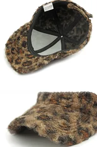 Macro shot of faux teddy fur leopard baseball cap with polyester lining detail
