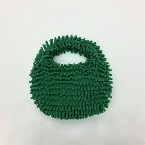 Detailed view of dark green plush mop bag with unique chenille textured fabric and handle