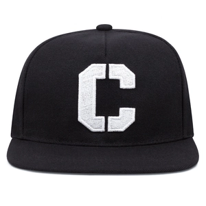 Black snapback hat with white embroidered C letter in a modern street fashion style