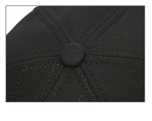Close-up of durable stitched crown and fabric texture on a black thermal winter baseball cap