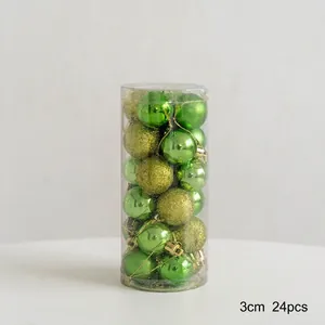 Detail of 24pcs 3cm Christmas ball set in green and gold finish with storage tube