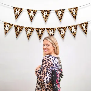 Leopard print Happy Birthday banner with white lettering and black hanging string
