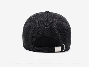 Rear view of dark grey wool baseball cap showing metal buckle adjustment and tweed texture