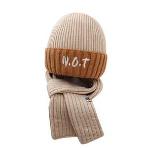 Two-piece color-block knit set for kids featuring a beige and caramel beanie and scarf
