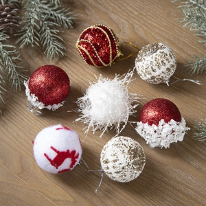 7-piece Christmas ball ornaments set with glitter, plush textures, and reindeer patterns