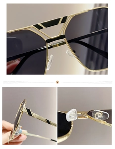 Details von Gold-Metall-Sonnenbrillenrahmen mit schwarzen Emailstreifen und Silikon-Nasenpads