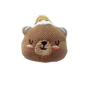 Handmade brown knitted bear head accessory with colorful embroidery for DIY crafts