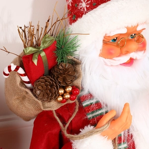 Standing Santa Claus figurine with red velvet hat and burlap gift bag for holiday decor