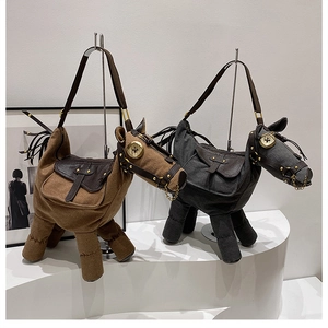 Detail showing horse-shaped canvas shoulder bags with brown leather patchwork and fringe