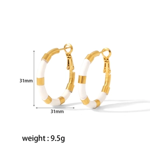 Modern 31mm 18k gold plated stainless steel hoops with white enamel finish and 9.5g weight