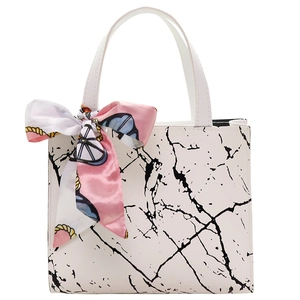 White marble pattern handbag with decorative silk scarf and spacious top-handle design