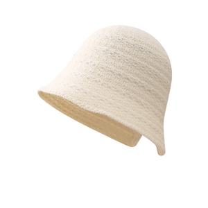 Creamy white knit bucket hat with waffle texture for women in minimalist Japanese style