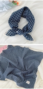 Detail of navy plaid cotton linen scarf with lace trim and Natural Style label