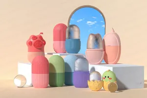 Various silicone ice face rollers in cat claw and chick shapes on marble steps