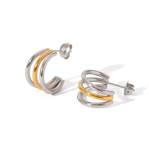 Detailed view of 18k gold triple-layer line hoop earrings in silver and gold finish