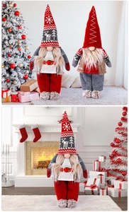 Detail of Christmas gnomes with tall red hats and festive holiday attire for home decor