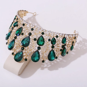 Baroque gold tiara crown with pear-shaped emerald gems and sparkling clear rhinestones