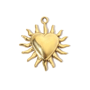 Detailed view of a golden sun-heart pendant in stainless steel with sunburst texture