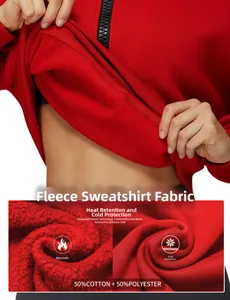Detail of red polar fleece hoodie lining showing 50% cotton 50% polyester blend fabric