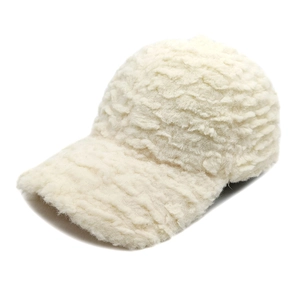 Close-up of white plush fleece texture on winter baseball cap with thick teddy fabric