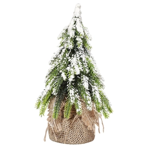 Miniature flocked Christmas tree with snow effect and burlap base on white background