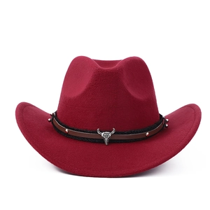 Burgundy wide brim western cowboy hat with vintage metal bull head skull accessory