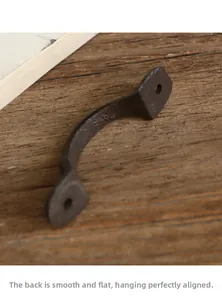 Detailed view of the flat back on this vintage cast iron handle for a seamless door fit