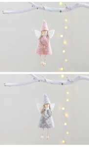 Pink and grey wool felt Christmas angel ornaments hanging on white branches with wooden beads