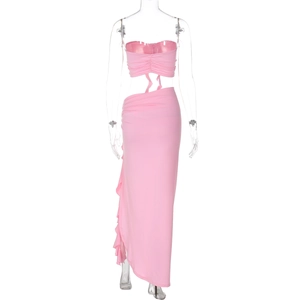 Pink two-piece set featuring slim fit crop tube top and side slit ruched long skirt