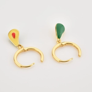 Detailed macro view of enamel avocado fruit earrings featuring the S925 hallmark
