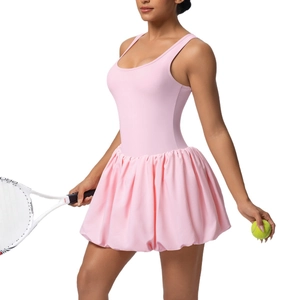 Pink tennis dress with bodysuit lining and racerback design for athletic performance