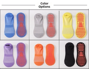 Detail view of anti-slip yoga socks with red silicone grip dots in six vibrant colors