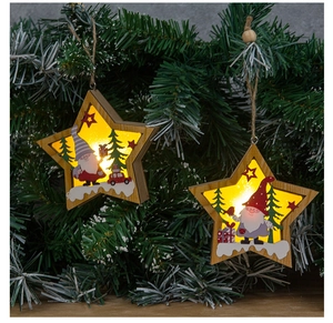 Hanging wooden star ornament with LED lights featuring a festive gnome and forest design