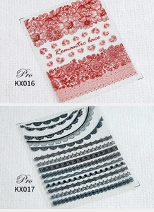 Detailed view of KX016 red floral and KX017 black lace adhesive nail art stickers