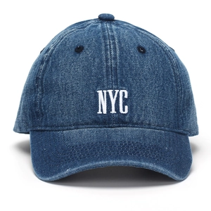 Classic denim blue baseball cap with white NYC embroidery in a minimalist vintage style