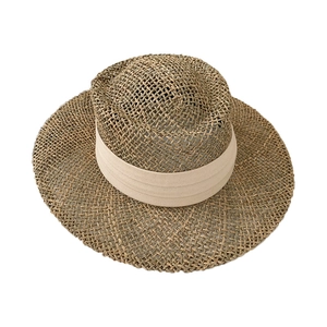 Handwoven straw sun hat with breathable mesh weave and a cream-colored decorative band