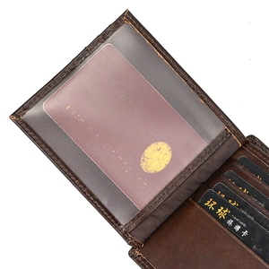 Detail shot of genuine leather wallet interior with card slots and clear ID window