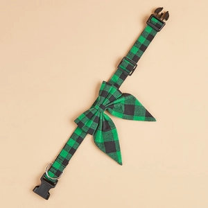 Detailed view of green buffalo plaid dog collar with sturdy black buckle and metal D-ring