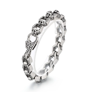 Vintage silver skull and wing punk bracelet for men in antique finish stainless steel