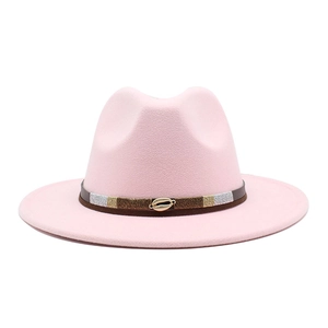 Detailed view of pink wool fedora hat featuring a multicolor band with a gold shell accent