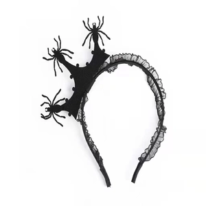 Detail of Halloween crown headband with three black spiders and delicate pleated mesh lace