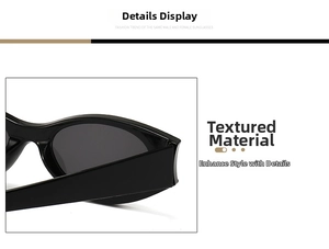 Detail of glossy black oval sunglasses showing the smooth hinge and dark grey lens