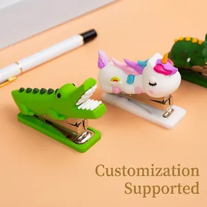 Portable mini cartoon stapler set featuring crocodile and unicorn designs for office and school