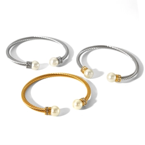 Twisted stainless steel cable bangles with pearls and crystals in gold and silver finish