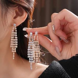 Elegant gold-plated sterling silver long fringe tassel earrings with cubic zirconia stones