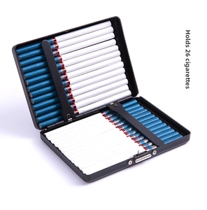 Detail view of black matte metal cigarette case interior with spring bar for 26 slim cigarettes