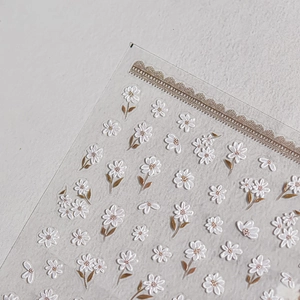 3D embossed white daisy flower nail art stickers with golden lace border accents